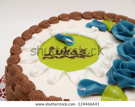 Baptism cake, white sugar paste, blue roses