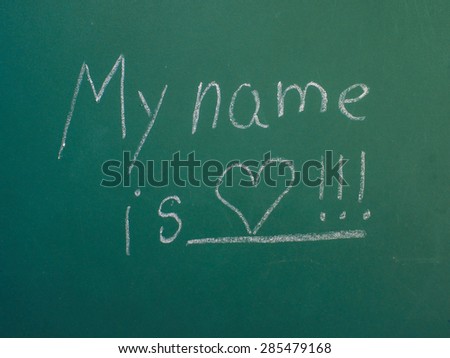 My name is love, written in white chalk on green chalkboard
