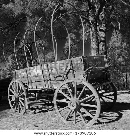 Black and white image of an old wagon from United States western frontier days