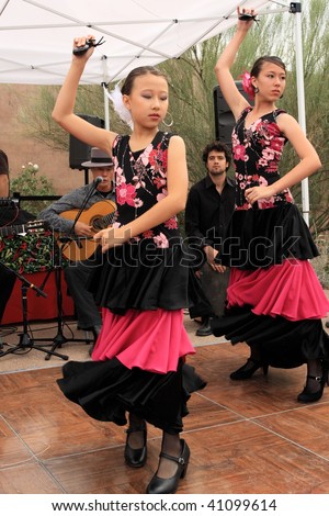 PHOENIX, AZ - NOVEMBER 14: Mosaico Flamenco company\'s younger performers dance at the Desert Botanical Garden Nov. 4, 2009 in Phoenix, Arizona.