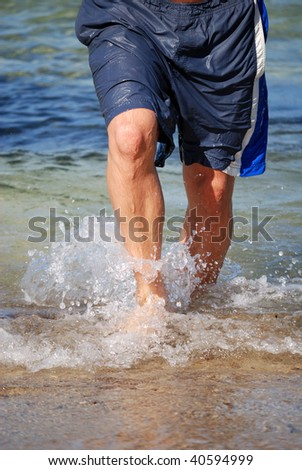 Man walking out of the sea