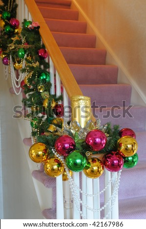 A Staircase Decorated In Colored Balls For The Christmas Season ...