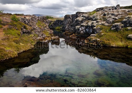 Deep fissure Flosagja at Thingvellir National Park, a fissure in the earth\'s crust where the european and american continental plates drift apart.