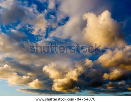 Dramatic sunset with light and heavy clouds