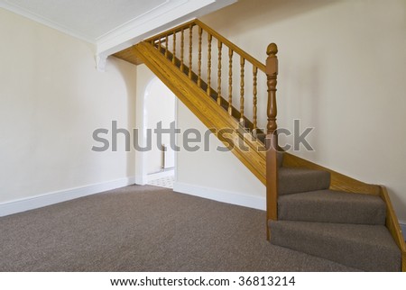 living room with a staircase to the next floor
