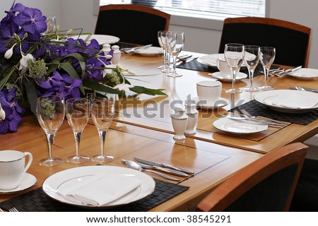 formal dining table set up with flowers