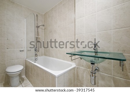 modern bathroom with floor to ceiling ceramic tiles