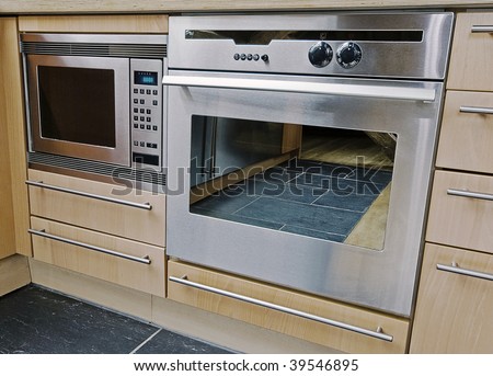 modern built in kitchen appliances in stainless steel