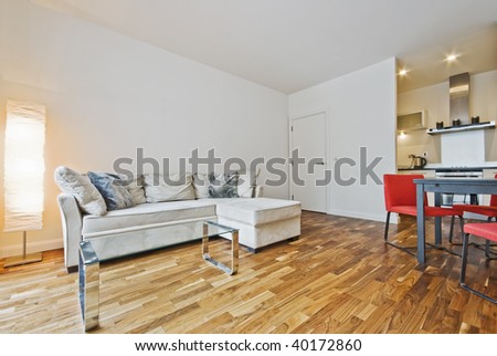 modern open plan living room with bulky corner sofa