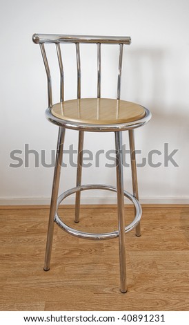 isolated tall bar chair With chrome frame and wooden seat