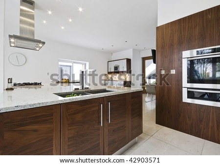 contemporary luxury kitchen with working isle and granite worktop