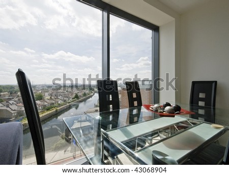 dining room with floor to ceiling window and views over canal