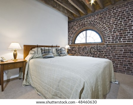 warehouse conversion bedroom with exposed brick work