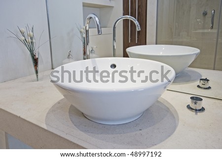 modern designer hand wash basin in a bowl shape