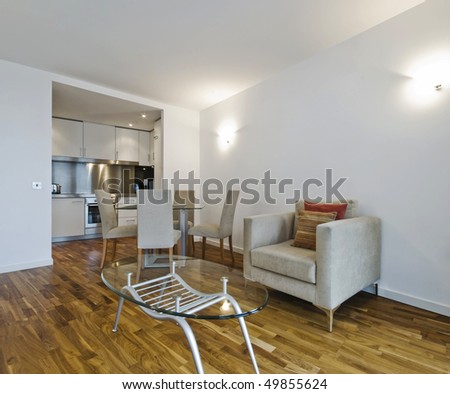 Dining Room on Open Plan Living Room With Smart Kitchen And Dining Area   Stock Photo