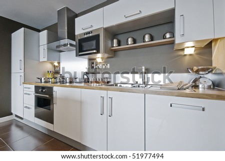 fully fitted modern kitchen with decorative elements