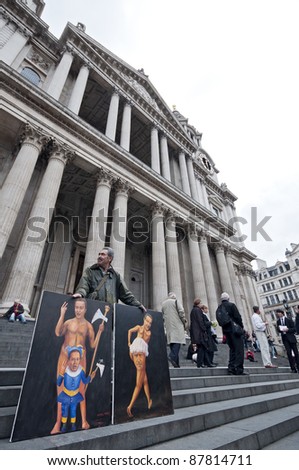 LONDON, UK -OCTOBER 31: Artist Kaya Mar, as he is signed on his paintings, displaying his work to the public on October 31, 2011 in London.