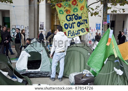 LONDON, UK -OCTOBER 31: This is how the Occupy London Camp looks like outside London Stock Exchange with a number of slogans and banners on October 31, 2011 in London.
