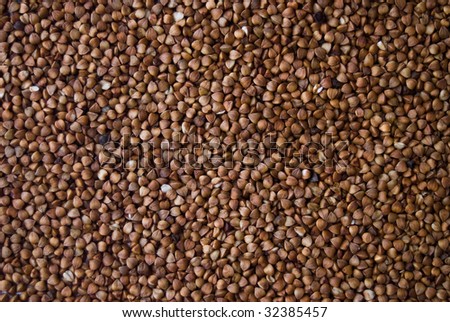 Brown buckwheat groats background. Please visit portfolio for other groats backgrounds.