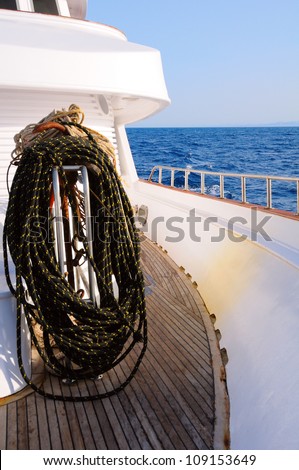 Bundle of rope on marine yacht on the sea