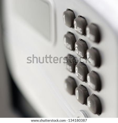 Digital safety deposit lock box safe with with digital lock, screen panel, numeral buttons. Shallow depth of field.