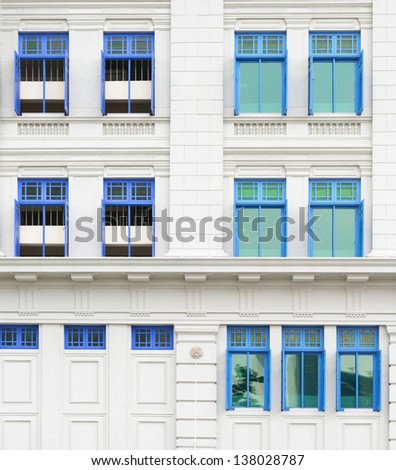 Retro windows with shutters in colonial architecture style building, Singapore