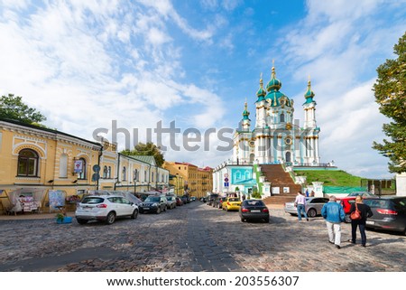 KIEV, UKRAINE - SEP 17, 2013: Saint Andrew orthodox churc and Andrew\'s descent is the major tourist attraction. It is area of many souvenir shops and art galleries.