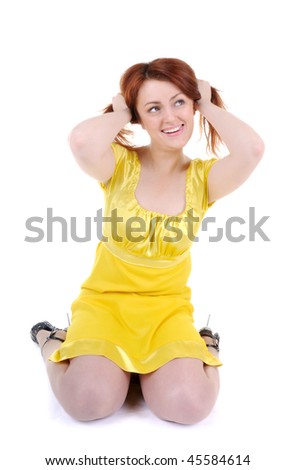  yellow dress plays with her red 