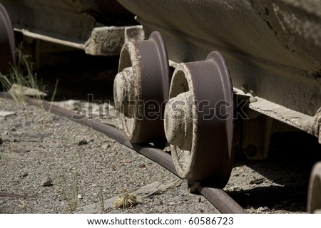 the wheels of old mine cart