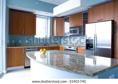 New Modern Kitchen Interior With Island In A Condo Apartment ...