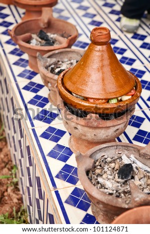 Moroccan handmade ceramic Tajine, preparing food