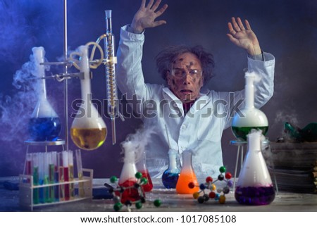 sad scientist with a failed experiment after the explosion in the lab