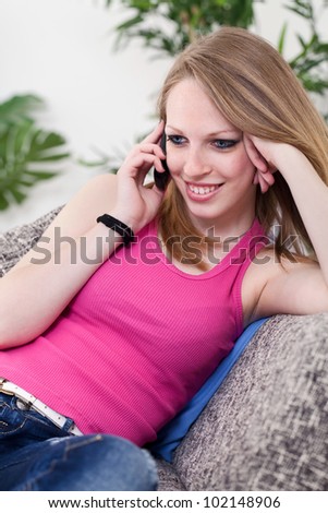 Beautiful girl talking on the phone , gossipy girl
