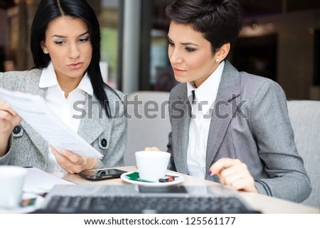 Two business women in meeting
