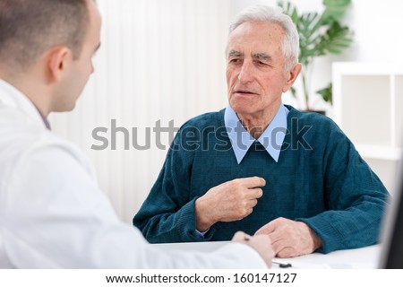 Senior Man Sits With His Doctor And He Complained Of Chest Pain