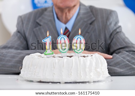 Birthday Cake With Lit Candles For A Century, One Hundredth Birthday