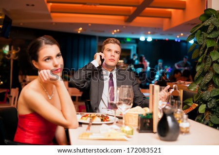 Young man making an boring  expression gesture on a bad dating
