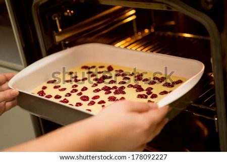 mixture for Cherry sponge  in baking pan cake before baking