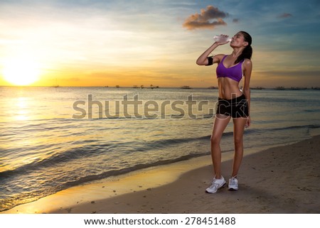 Running woman, female runner jogging during outdoor workout on beach., fitness model outdoors.