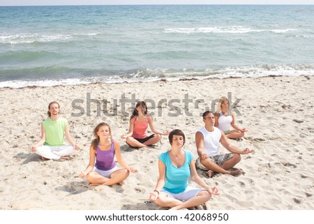 meditation group on the beach, from top view