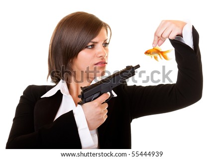 young  dangerous woman holding one gold fish and gun