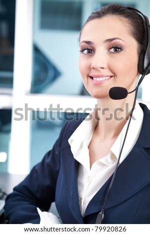 support phone operator with headset at workplace