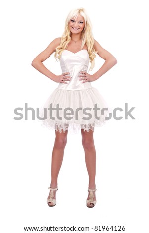 smiling woman posing in white dress, isolated on white background
