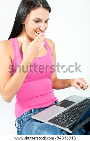 surprised girl looking in laptop, facial expression, isolated on white background