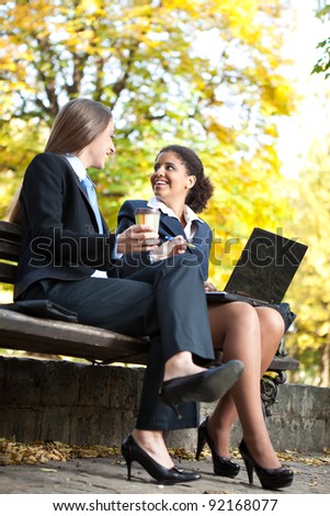 business people on coffee break talking about job