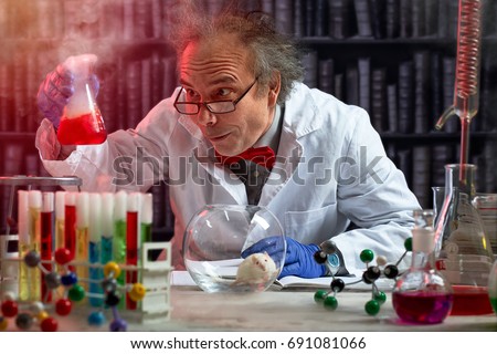 crazy scientist the making mix of chemicals to experiment on mouse