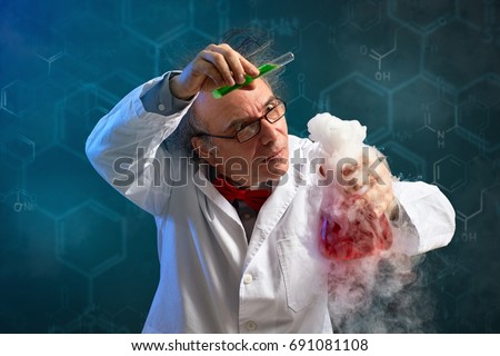 Wacky chemist carefully performed experiment with red toxic chemical and smoke