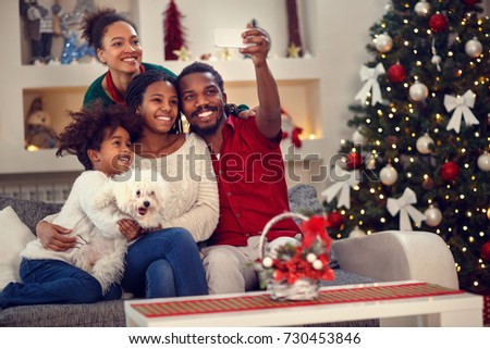 Christmas selfie - Afro American family making together selfie