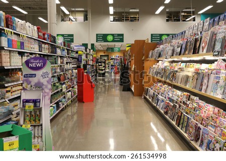 Port Coquitlam, BC Canada - March 17, 2015 : A section display magazines from shelf in supermarket