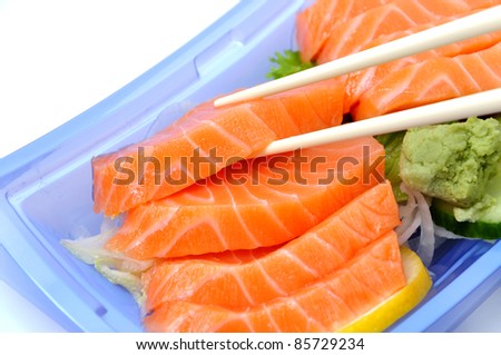 Eating salmon sushi